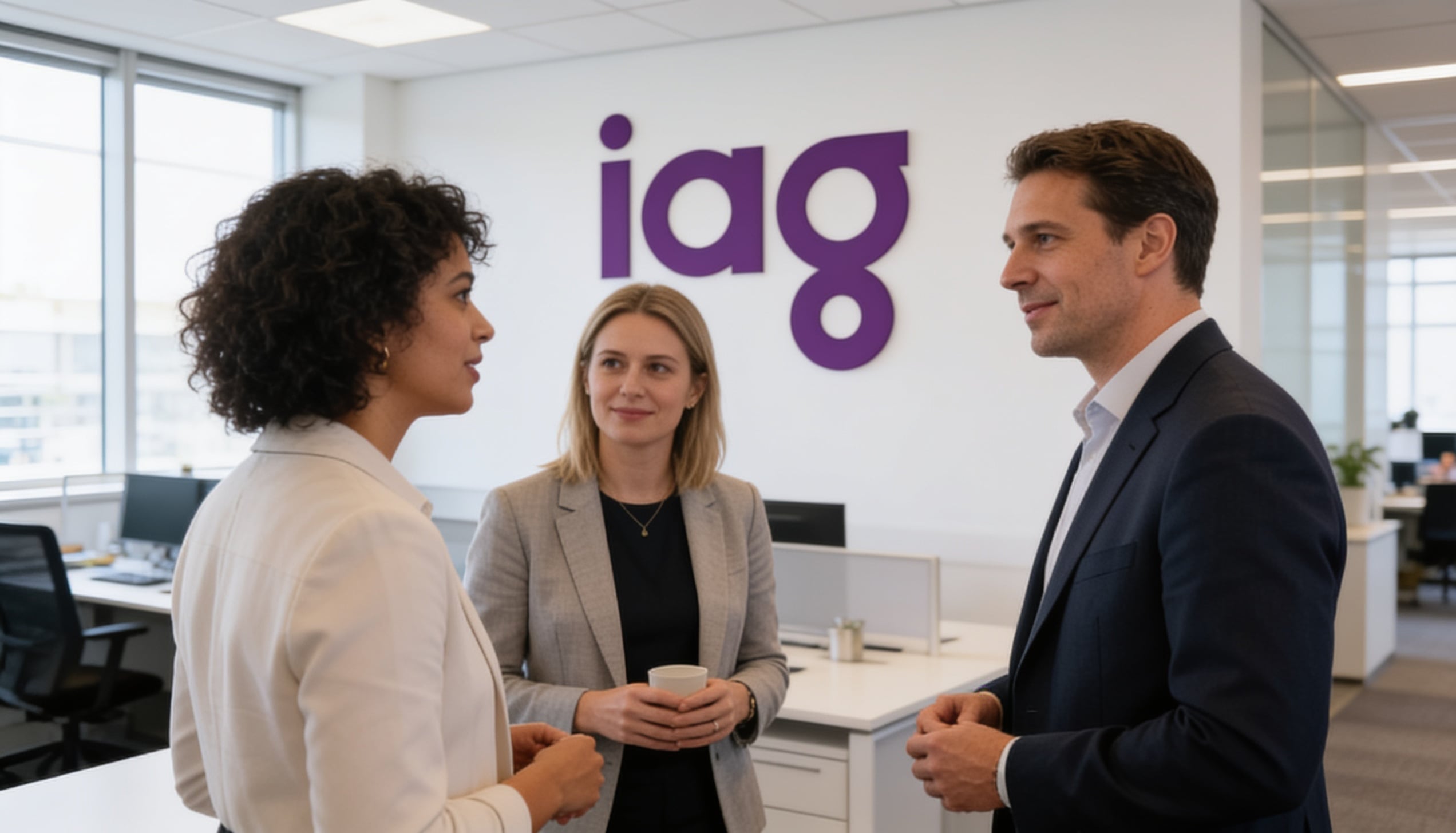 IAG employees talking to each other